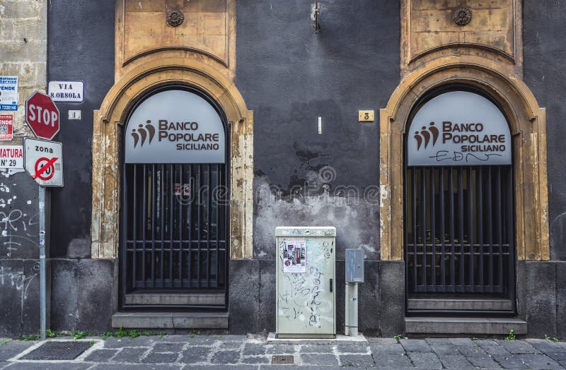 Catania, Italy - December 16, 2016: Banco Popolare Siciliano BMP bank in historic part of Catania city, Sicily. Catania, Italy - December 16, 2016: Banco Popolare Siciliano BMP bank in historic part of Catania city, Sicily