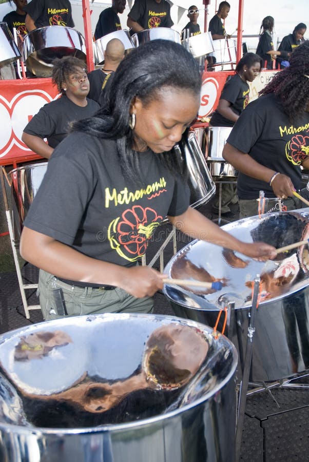 A Band and Member from Metronomes Steel Orchestra Editorial Photo