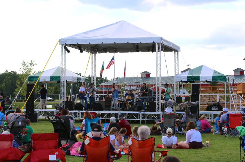 A Band Performs Onstage At The Discovery Park Of America Union