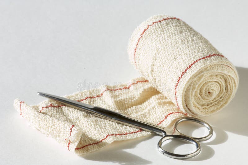 Medical Bandages With Scissors And Sticking Plaster Stock Photo, Picture  and Royalty Free Image. Image 58653884.