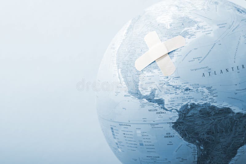 A view of a pale blue globe with crisscrossed bandages on it. Possible theme: Financial crisis. A view of a pale blue globe with crisscrossed bandages on it. Possible theme: Financial crisis