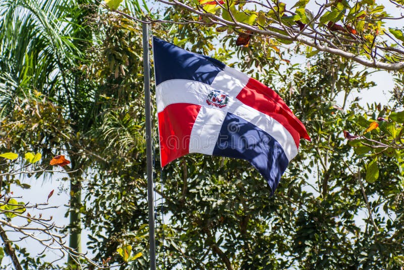 Bandeira da República Dominicana na tecelagem do polo imagens de stock Bandeira da República Dominicana na tecelagem do polo imagens de stock