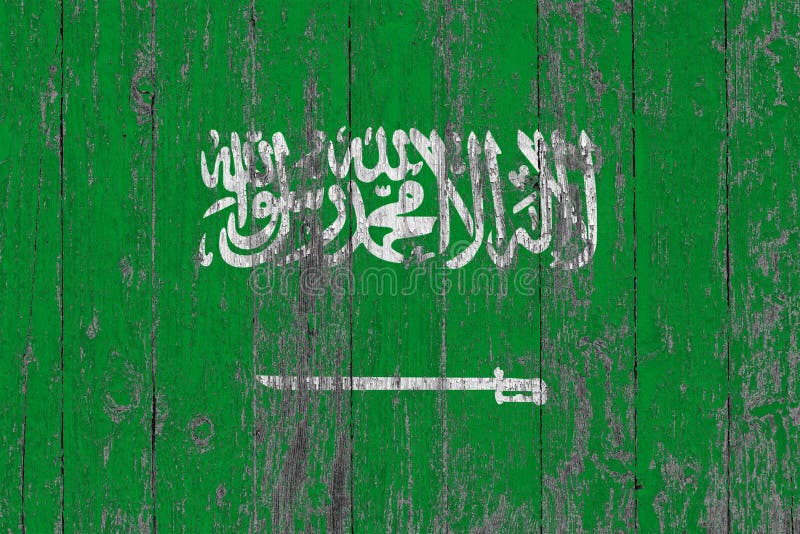 A bandeira de Arábia Saudita pintou para fora em fundo de madeira gasto da textura fotos de stock royalty free A bandeira de Arábia Saudita pintou para fora em fundo de madeira gasto da textura fotos de stock royalty free