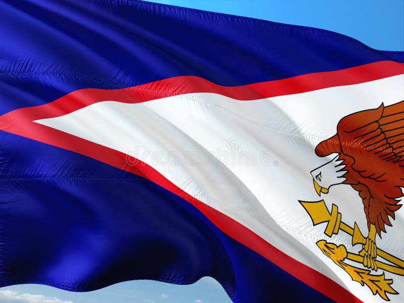 Bandeira de Samoa Americana que acena no vento contra o c?u azul profundo Tela de alta qualidade imagem de stock royalty free Bandeira de Samoa Americana que acena no vento contra o c?u azul profundo Tela de alta qualidade imagem de stock royalty free