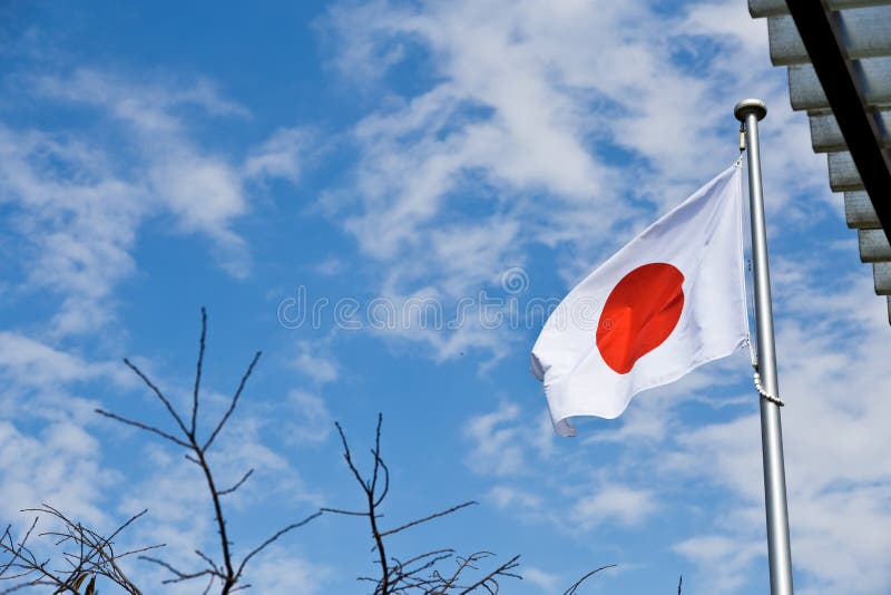 Japanese flag with blue sky Japananese navy flag. Japanese flag with blue sky Japananese navy flag