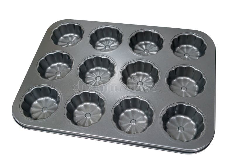 Bandeja vazia do queque do queque do metal para cozer isolado no CCB branco fotografia de stock Bandeja vazia do queque do queque do metal para cozer isolado no CCB branco fotografia de stock