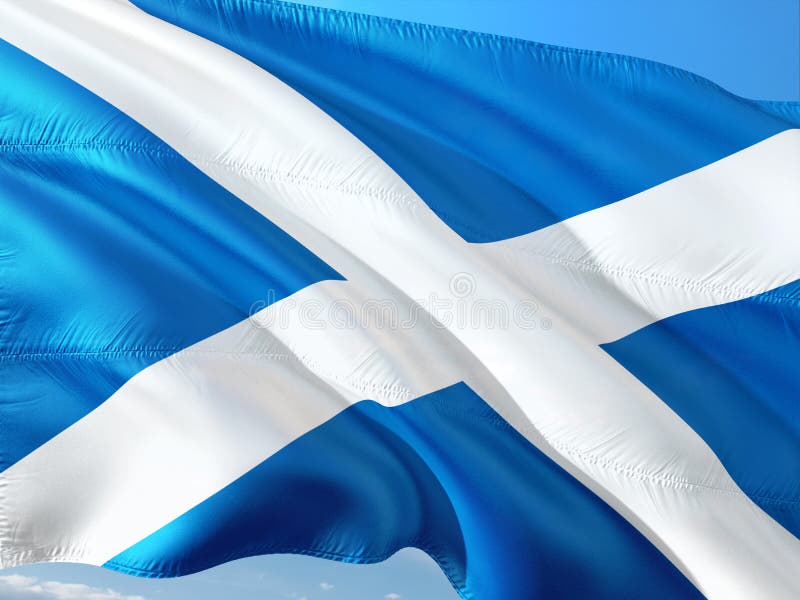 Bandera de Escocia que agita en el viento contra el cielo azul profundo Tela de alta calidad imagen de archivo Bandera de Escocia que agita en el viento contra el cielo azul profundo Tela de alta calidad imagen de archivo