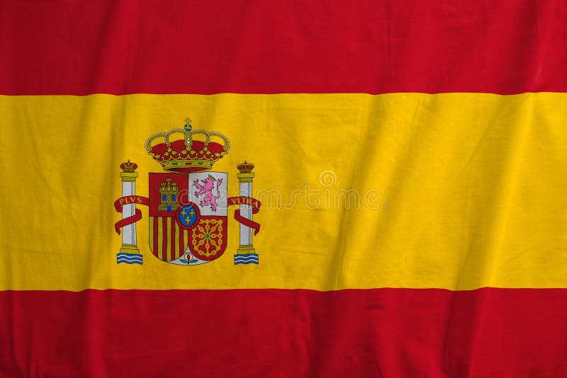 Bandera española que sopla en el viento imagen de archivo libre de regalías Bandera española que sopla en el viento imagen de archivo libre de regalías