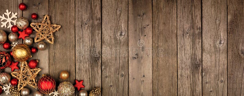Banderole du coin de Noël rouge et or, vue sur fond de bois image stock