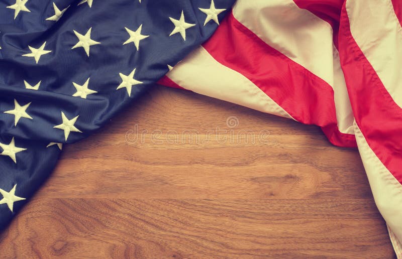 American flag border on American walnut wood with space for text, Memorial day concept background. American flag border on American walnut wood with space for text, Memorial day concept background