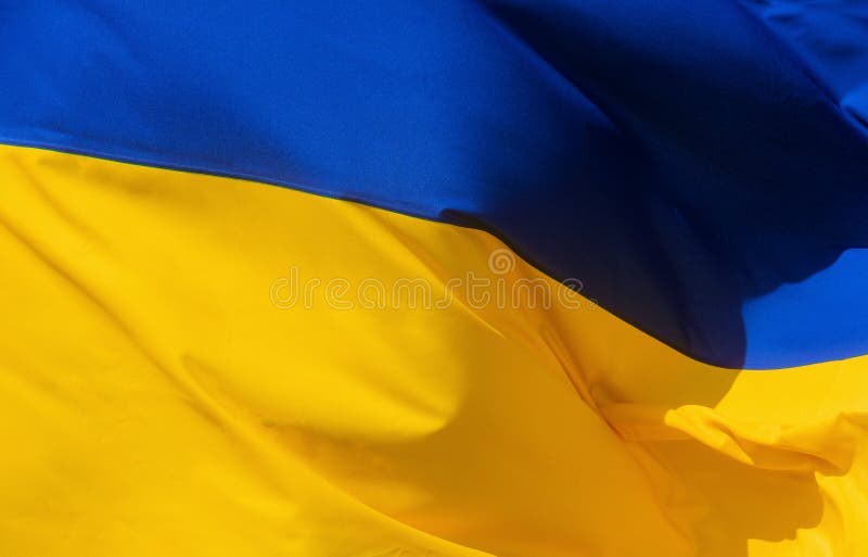 Bandiera d'onda di tessuto dell'Ucraina fotografie stock Bandiera d'onda di tessuto dell'Ucraina fotografie stock