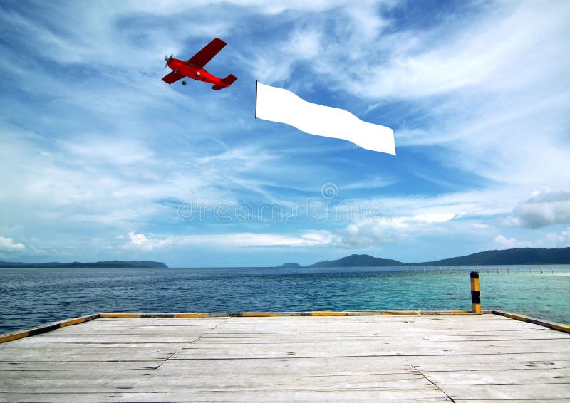 Bandiera di aeroplano sulla spiaggia