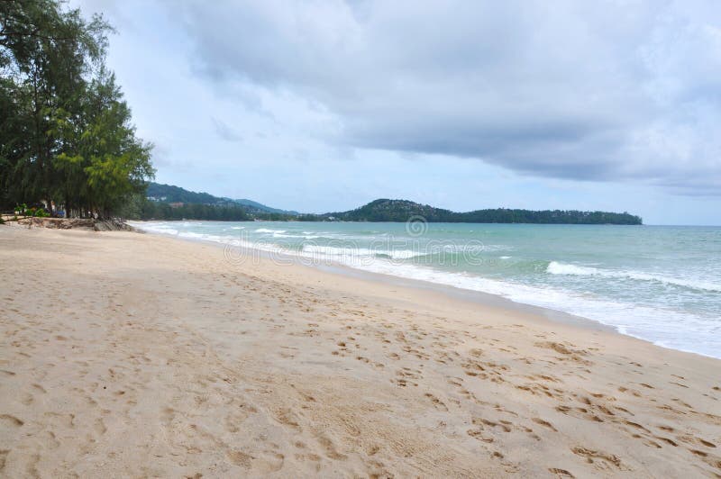 Bang Tao Beach at Phuket Thailand with Cloudy Sky