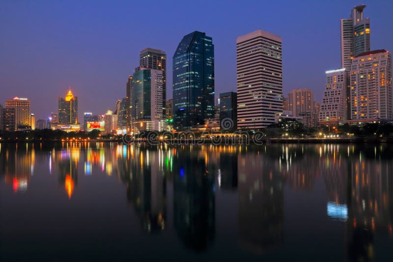 Bangkok city at night with reflection of skyline, Bangkok,Thailand