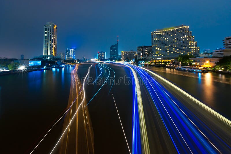 Bangkok cityscape with river at night