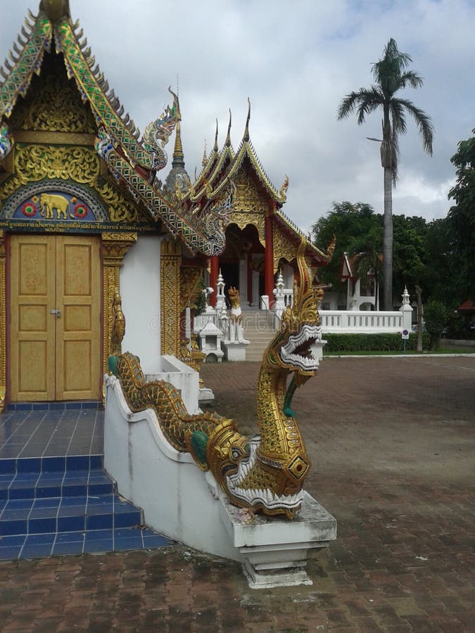 A golden dragon as decoration of a large temple. A golden dragon as decoration of a large temple