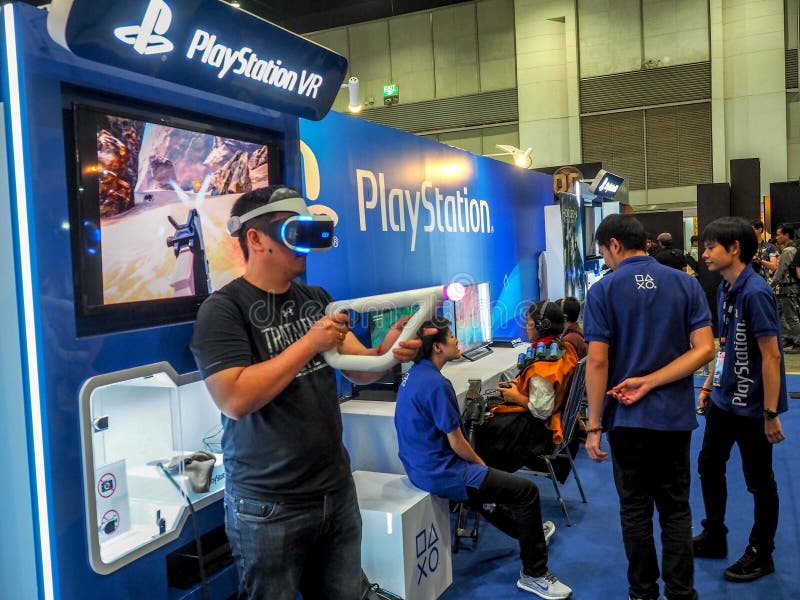 BANGKOK, THAILAND - APRIL 23, 201: Newest Virtual Reality Games by PlayStation 4. Young with Pleasure Uses VR Head-mounted Editorial Photography Image of games, 143168317