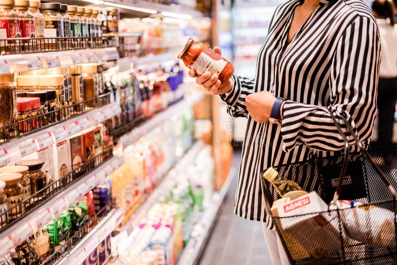 Bangkok, THAILAND - August 5, 2019: Woman chooses products in the supermarket, Ready-made food, Shopping