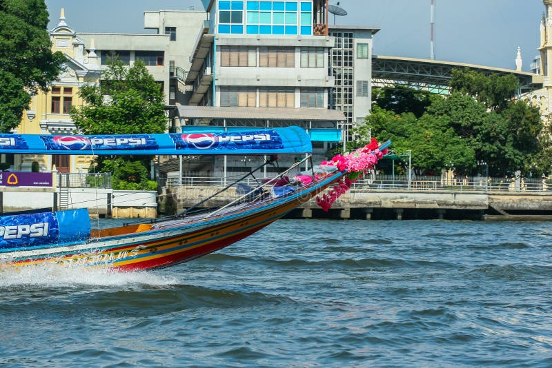Authentic Boats and Modern Ships Floating by the River on Background of