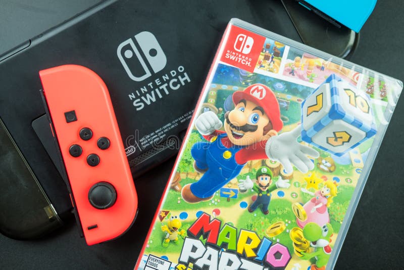 Bangkok, Thailand - December 22, 2021 : A box of new game a Mario Party Superstars and Joy-Con, the Nintendo Switch