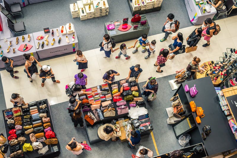 People walk among stalls at shopping mall, a top-down view royalty free stock photography