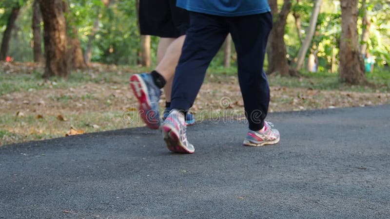 People children ,adult ,elder running , jogging and walk in public park for them body strong up and cheerful body and mind.