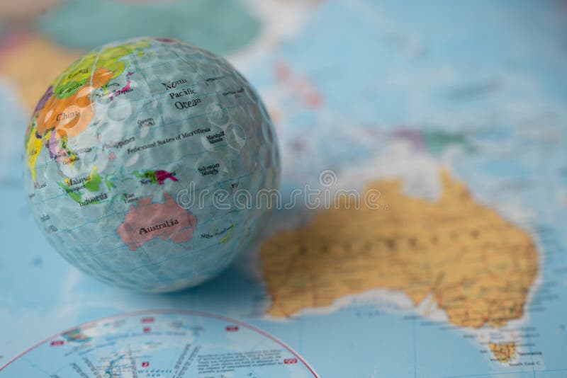 Bangkok, Thailand, May 1, 2021 Australia map at golf ball with flag on world globe map