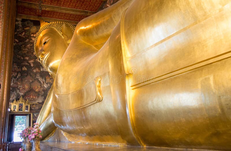 BANGKOK, THAILAND - OCTOBER 14, 2016: View at the Reclining Buddha statue inside of Wat Pho temple