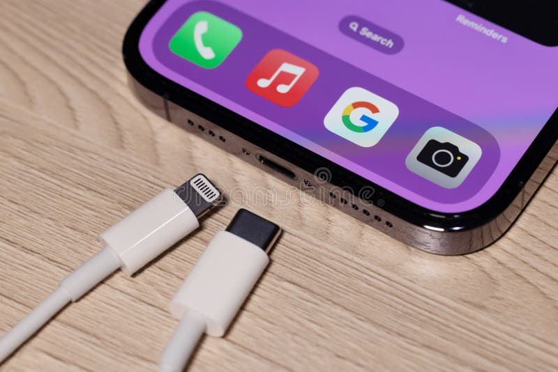 BANGKOK,THAILAND-OCTOBER 28:View of Apple Iphone with Both Usb-c and Lightning Cable Charger. EU Forced Apple Iphone to Use Usb-c Instead of Lighting Cable in 2024 on October 28,2022. BANGKOK,THAILAND-OCTOBER 28:View of Apple Iphone with Both Usb-c and Lightning Cable Charger. EU Forced Apple Iphone to Use Usb-c Instead of Lighting Cable in 2024 on October 28,2022