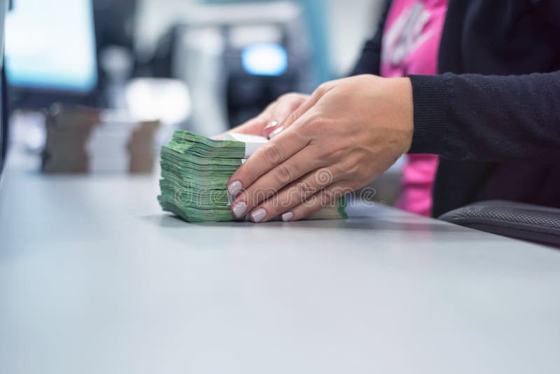Bank Employees Sorting and Counting Money Inside Bank Vault. Large