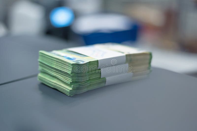 Bank Employees Sorting and Counting Money Inside Bank Vault. Large