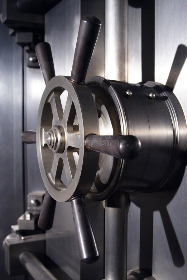 A stock image of a retro steel bank vault.