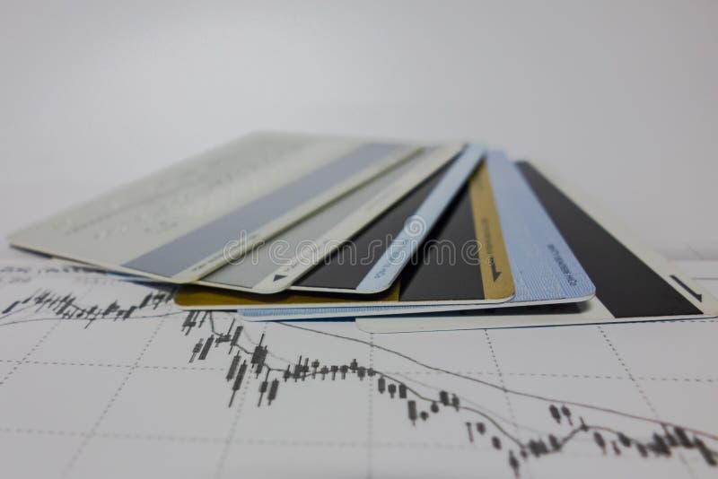 Bankkarten und Börsediagramme lizenzfreie stockfotografie Bankkarten und Börsediagramme lizenzfreie stockfotografie