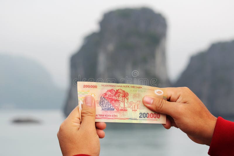 A Vietnamese Note of Two Hundred Thousand Shot Against the Limestone in Ha  Long Bay that is Printed in the Note Stock Photo - Image of halong, market:  123649000