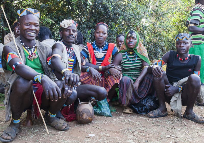 KEY AFAR VILLAGE, OMO VALLEY. ETHIOPIA - JANUARY 2, 2014: Unidentified Banna people at local village market. KEY AFAR VILLAGE, OMO VALLEY. ETHIOPIA - JANUARY 2, 2014: Unidentified Banna people at local village market.