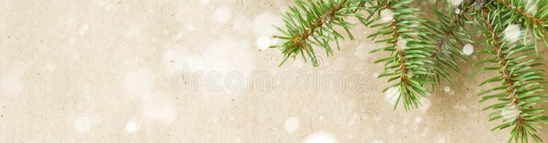 banner of Festive christmas corner with fir branches and snowflakes with snow on rustic beige background stock images banner of Festive christmas corner with fir branches and snowflakes with snow on rustic beige background stock images