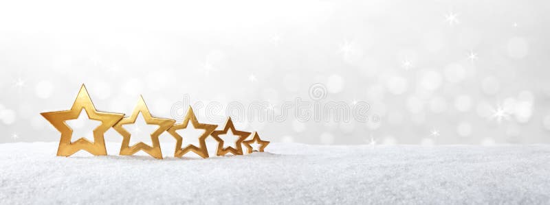 Bannière d'or de neige de cinq étoiles photographie stock libre de droits Bannière d'or de neige de cinq étoiles photographie stock libre de droits