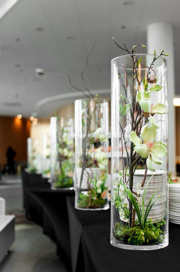 Banquet table for guests with orchid decoration