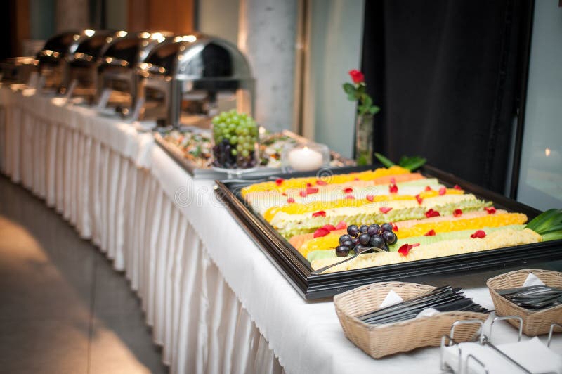 Banquet table for guests with starters and snacks