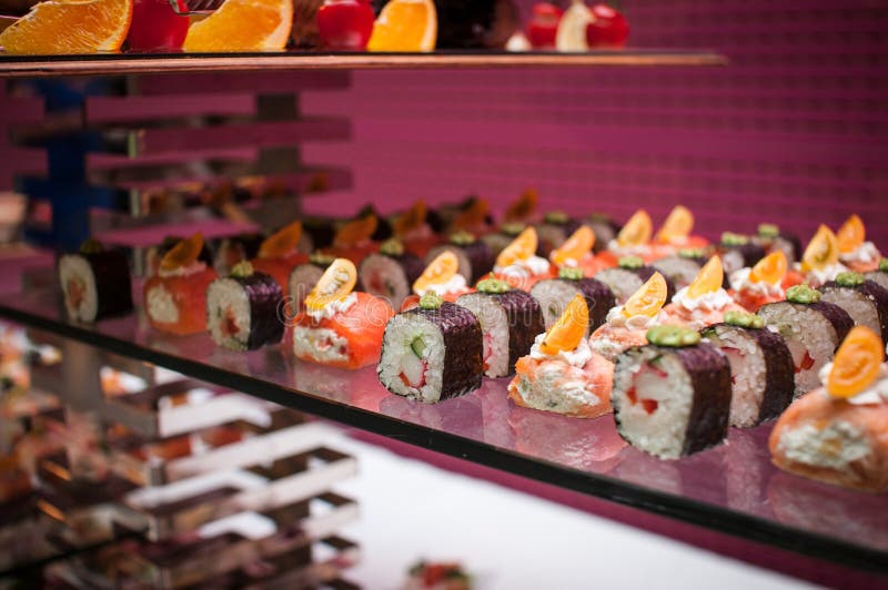 Banquet table for guests with sushi