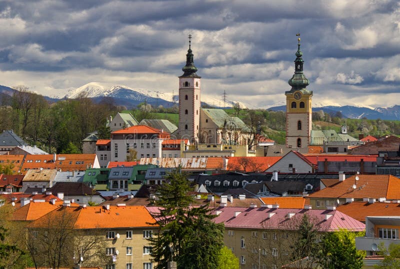 Banska Bystrica town during spring with Low Tatras mountains on horizon