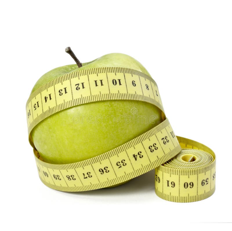 Close up of measure tape and green apple on white background with clipping path. Close up of measure tape and green apple on white background with clipping path