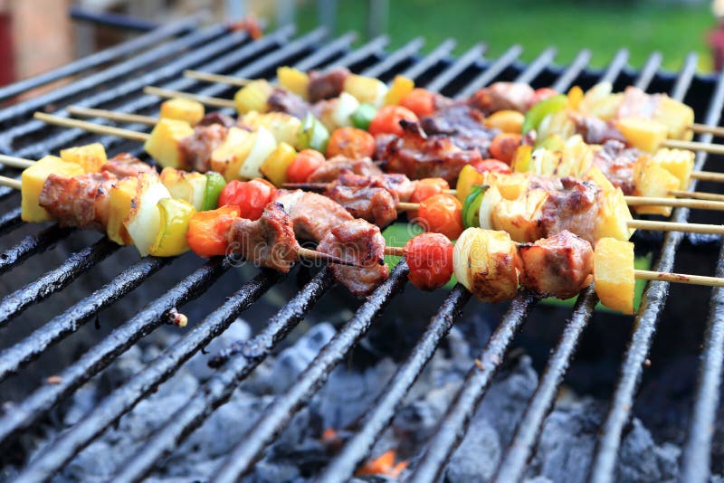 Bar-B-Q or BBQ with kebab cooking. coal grill of c