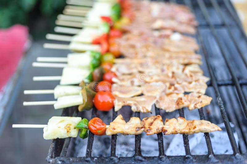 Bar-B-Q or BBQ with kebab cooking. coal grill of chicken meat sk