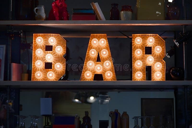 Bar light sign stock image. Image of couter, dark, light 129469965
