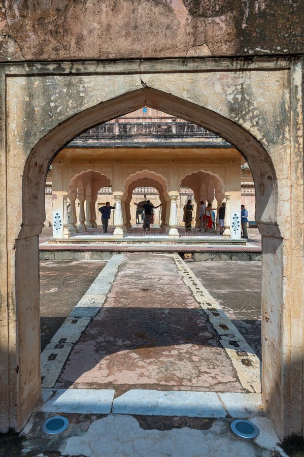 Baradari Pavilion in the Amber, Fort Amer , Rajasthan, India. Ornate gateway to the vast Amber Palace complex, with a painting of the Hindu elephant deity Ganesh.A narrow 4WD road leads up to the entrance gate, known as the Suraj Pol (Sun Gate) of the fort. It is now considered much more ethical for tourists to take jeep rides up to the fort, instead of riding the elephants. Amer Fort or Amber Fort is a fort located in Amer, Rajasthan, India. Amer is a town with an area of 4 square kilometres (1.5 sq mi) located 11 kilometres (6.8 mi) from Jaipur, the capital of Rajasthan. Located high on a hill, it is the principal tourist attraction in Jaipur. Amer Fort is known for its artistic style elements. With its large ramparts and series of gates and cobbled paths, the fort overlooks Maota Lake which is the main source of water for the Amer Palace. Baradari Pavilion in the Amber, Fort Amer , Rajasthan, India. Ornate gateway to the vast Amber Palace complex, with a painting of the Hindu elephant deity Ganesh.A narrow 4WD road leads up to the entrance gate, known as the Suraj Pol (Sun Gate) of the fort. It is now considered much more ethical for tourists to take jeep rides up to the fort, instead of riding the elephants. Amer Fort or Amber Fort is a fort located in Amer, Rajasthan, India. Amer is a town with an area of 4 square kilometres (1.5 sq mi) located 11 kilometres (6.8 mi) from Jaipur, the capital of Rajasthan. Located high on a hill, it is the principal tourist attraction in Jaipur. Amer Fort is known for its artistic style elements. With its large ramparts and series of gates and cobbled paths, the fort overlooks Maota Lake which is the main source of water for the Amer Palace.