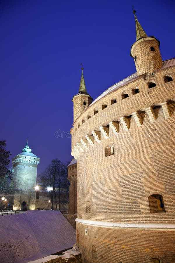 Barbakan and Florian Gate in Krakow seen during evening.