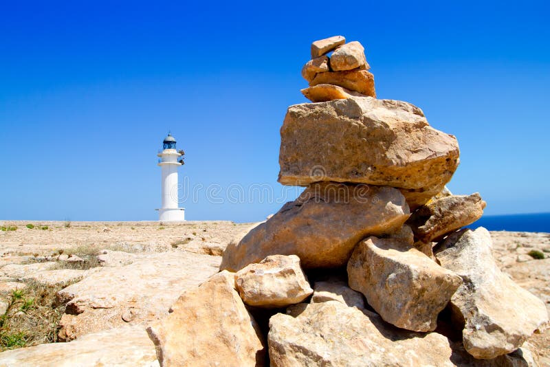 Barbaria formentera Lighthouse make a wish stones stock photos Barbaria formentera Lighthouse make a wish stones stock photos