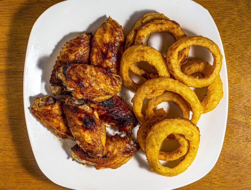 Barbecue Chicken Wings with Onion Rings Stock Photo Image of food