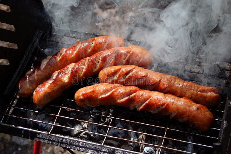 Sausages and chicken kebabs on a barbecue. Roasted skewer grill stock images, royalty-free photos and pictures